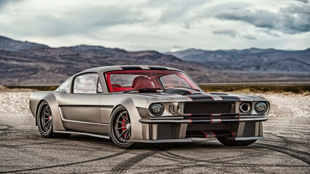 Silver titanium Mustang in 4K Ultra HD with dramatic mountain landscape wallpaper background