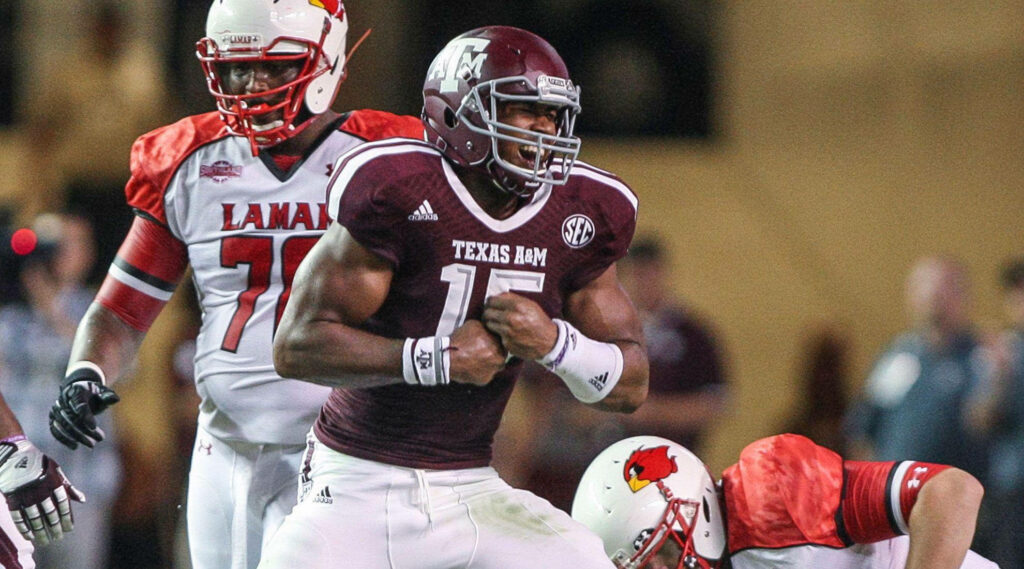 Myles Garrett Texas A&M football celebrating intense play vs Lamar maroon white uniforms wallpaper