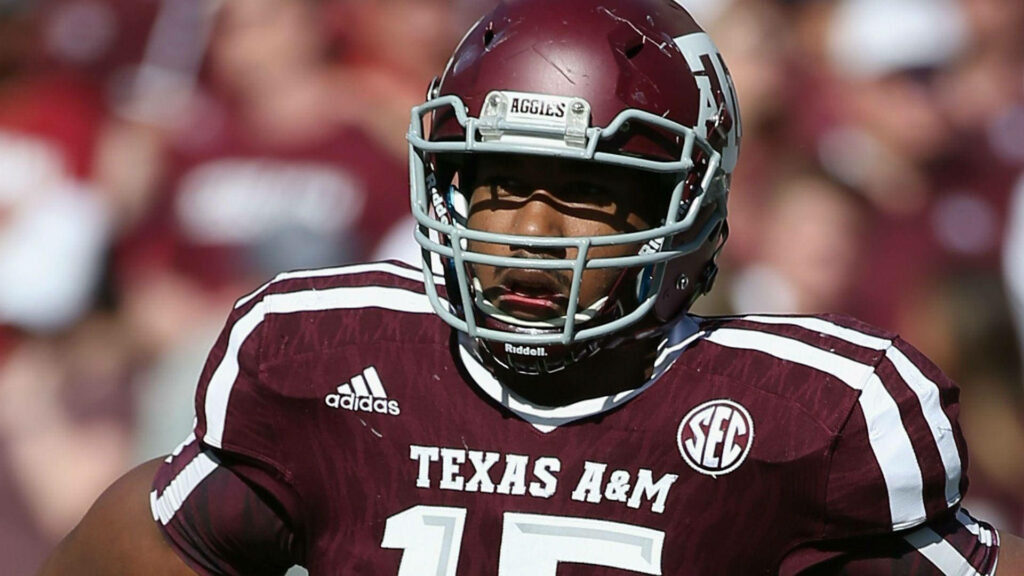 Myles Garrett Texas A&M football close-up intense expression maroon white uniform wallpaper