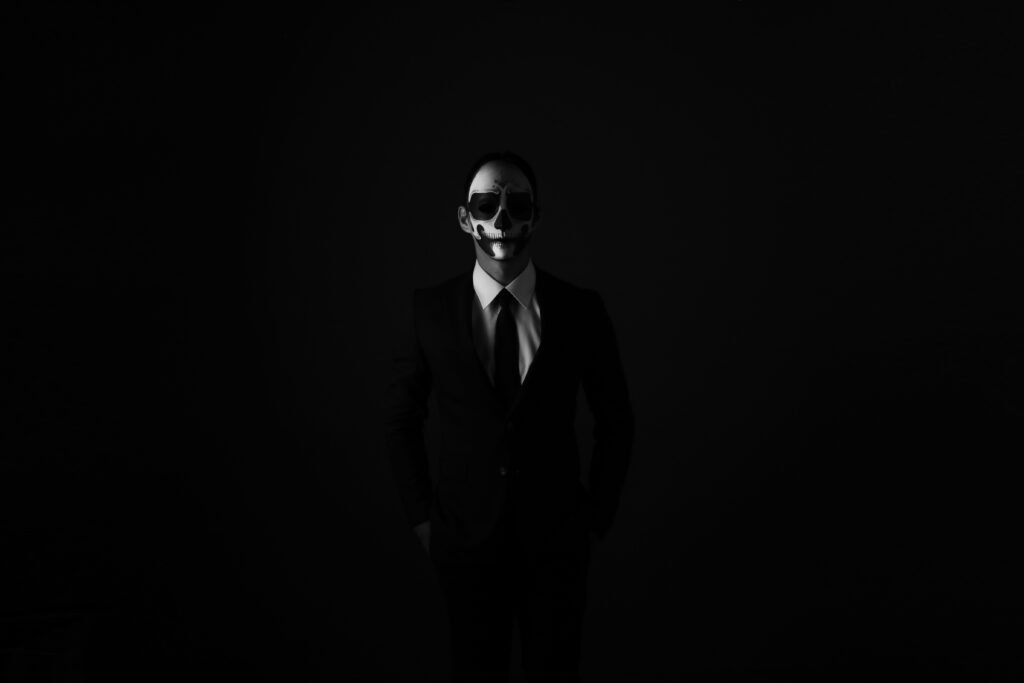 Mysterious Black and White Wallpaper: Suit, Tie & Mask Design