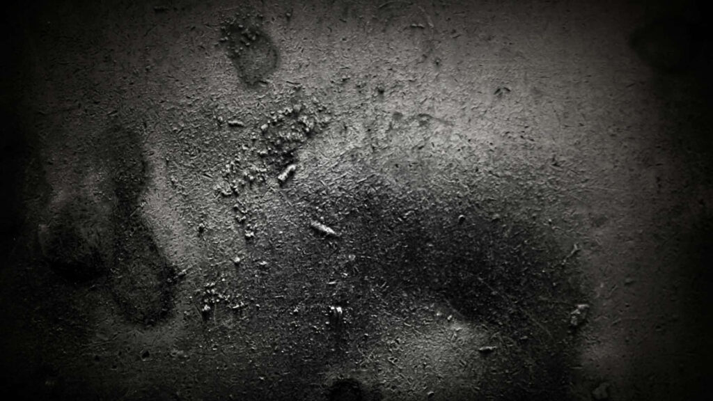 Moody Textured Dark Wallpaper with Rough Surfaces & Subtle Shadows