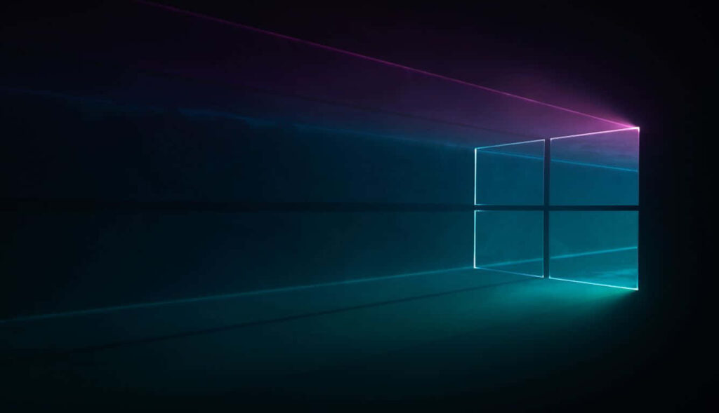 Branding Brilliance: Mesmerizing Windows 10 Background with Vibrant Logo and Enchanting Shadow on a Midnight Black Canvas Wallpaper
