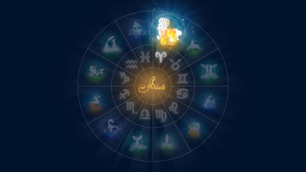Mystical Aries zodiac wallpaper glowing fiery on deep cosmic blue astrological wheel background