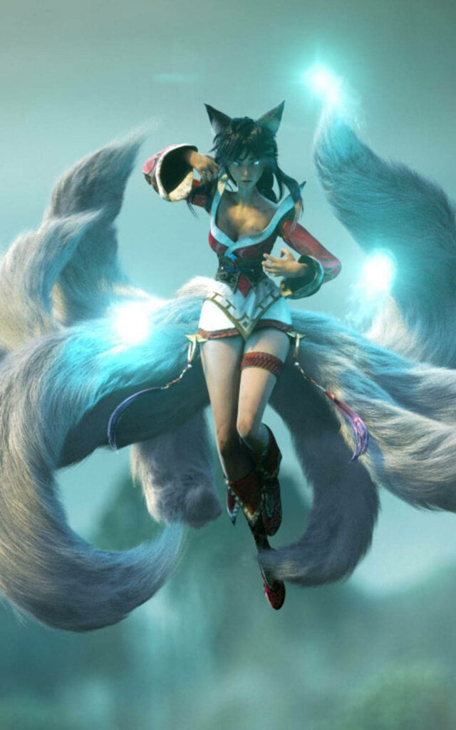 Ahri, the Mystic Vixen: A Mesmerizing Display of Levitation and Turquoise Radiance Wallpaper