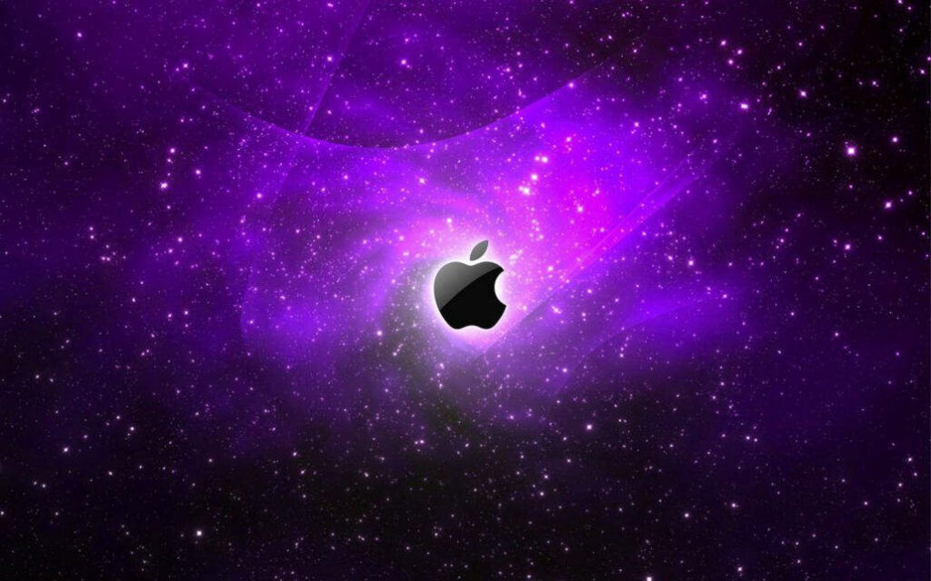 Interstellar Delight: An Enchanting Purple Galaxy Embracing the Iconic Black Apple Logo Wallpaper