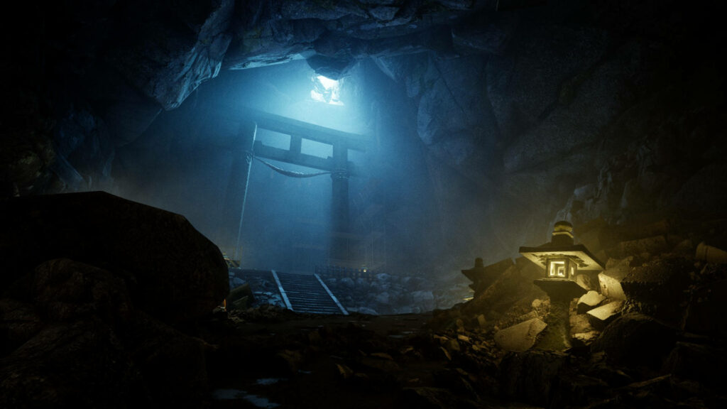 Mystical underground Torii gate glowing blue surrounded by rocky cave walls Ghostwire Tokyo wallpaper
