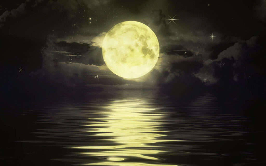 Glimmers of Celestial Serenity: Moonglow Illuminates the Night Sky Amidst Gentle Sea Waves and Stellar Oasis Wallpaper