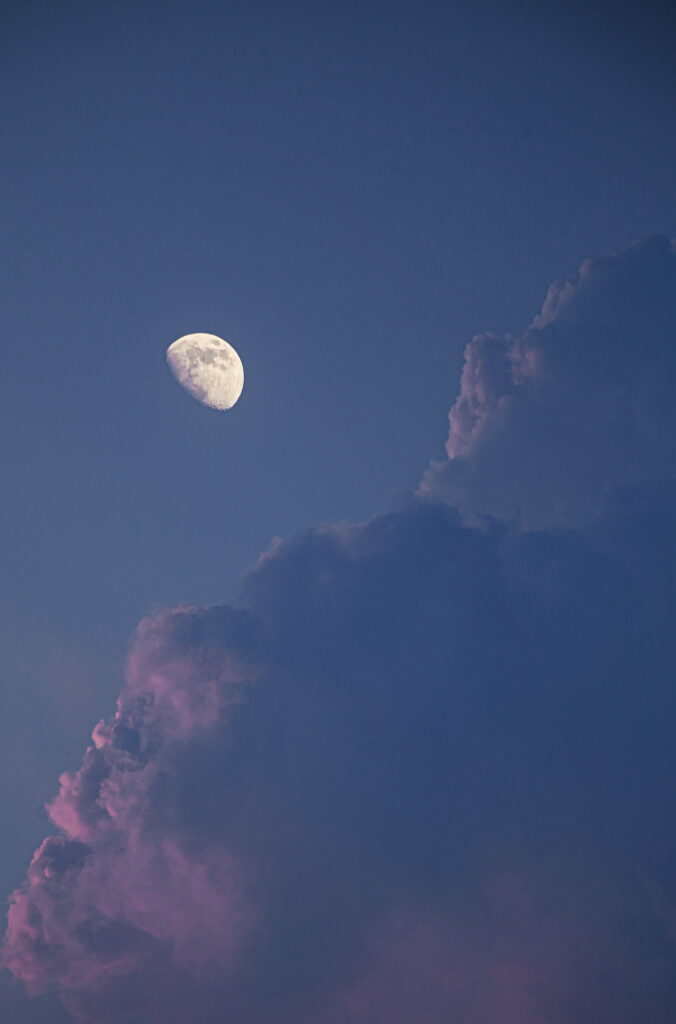 Luminous Lunar Majesty: HD Phone Wallpaper with Captivating Clouds and a Majestic Full Moon as a Background