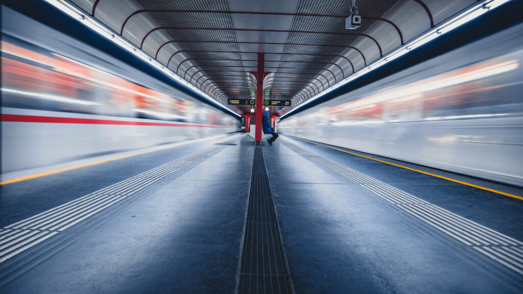 Majestic Blur: A Timeless Journey through the Train Station Wallpaper