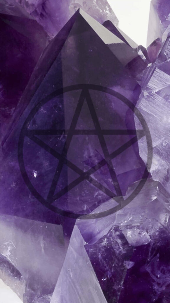 Vivid purple amethyst crystal wallpaper with gothic pentagram star creating mystical ambiance