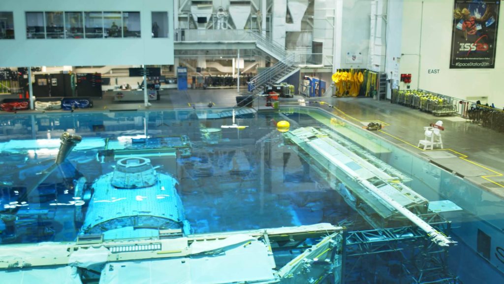 NASA Neutral Buoyancy Laboratory pool with submerged ISS modules for astronaut training wallpaper