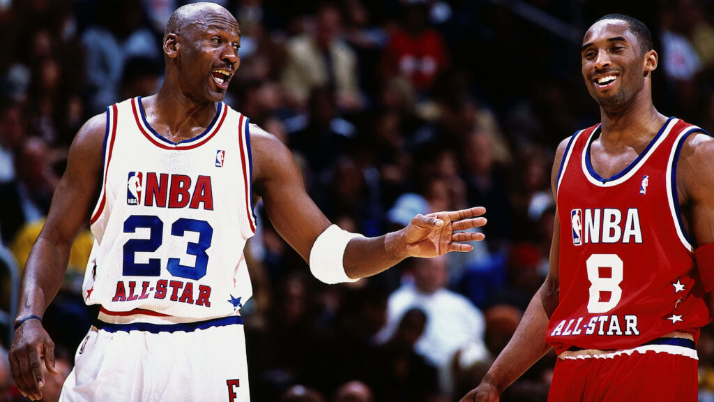 Basketball Icons Collide: A Legendary Encounter at the 2003 NBA All-Star Game Wallpaper