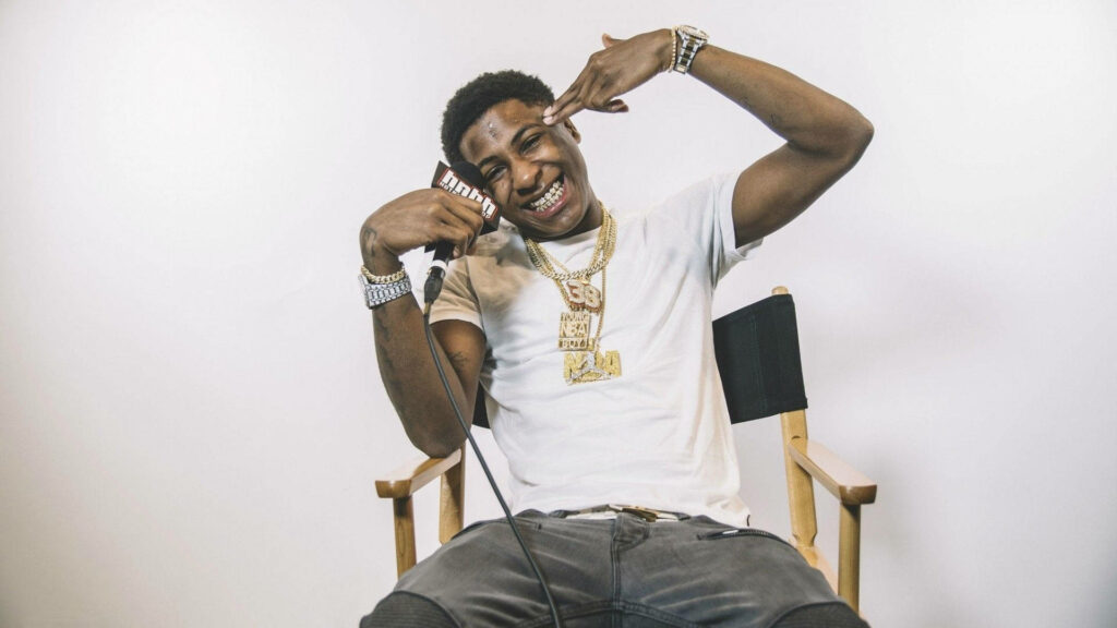 NBA Youngboy Takes the Director's Chair: A Playful Portrait on Set Wallpaper