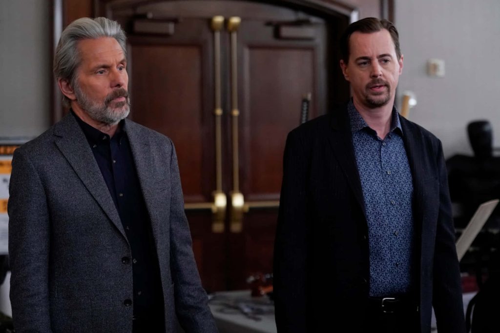 Gary Cole and Sean Murray NCIS actors in formal attire by wooden doors serious promotional wallpaper