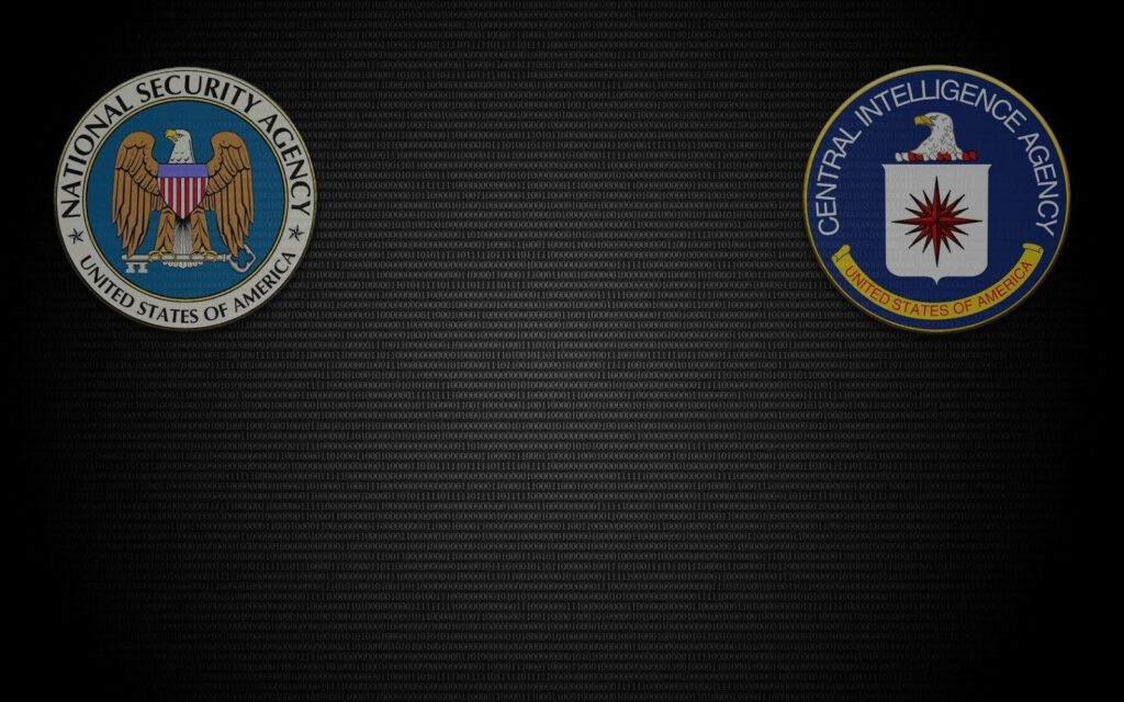 Wallpaper with NSA and CIA official seals on dark textured background with digital code patterns