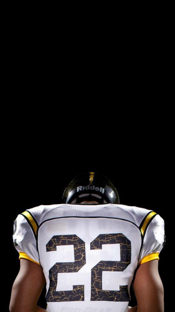 Najee Harris iPhone Wallpaper - Dynamic 22 Jersey on Black Background