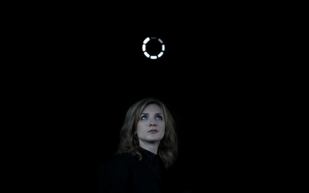 Minimalist Black Mirror Wallpaper: Nanette Cole & Glowing Icon