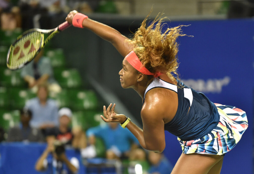 Dynamic Naomi Osaka Wallpaper: Powerful Serve at Toray Pan Pacific Open