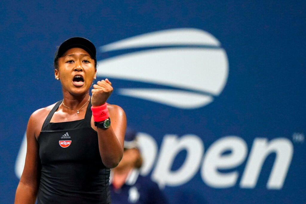 Naomi Osaka's Intense Victory Moment: US Open Wallpaper Background
