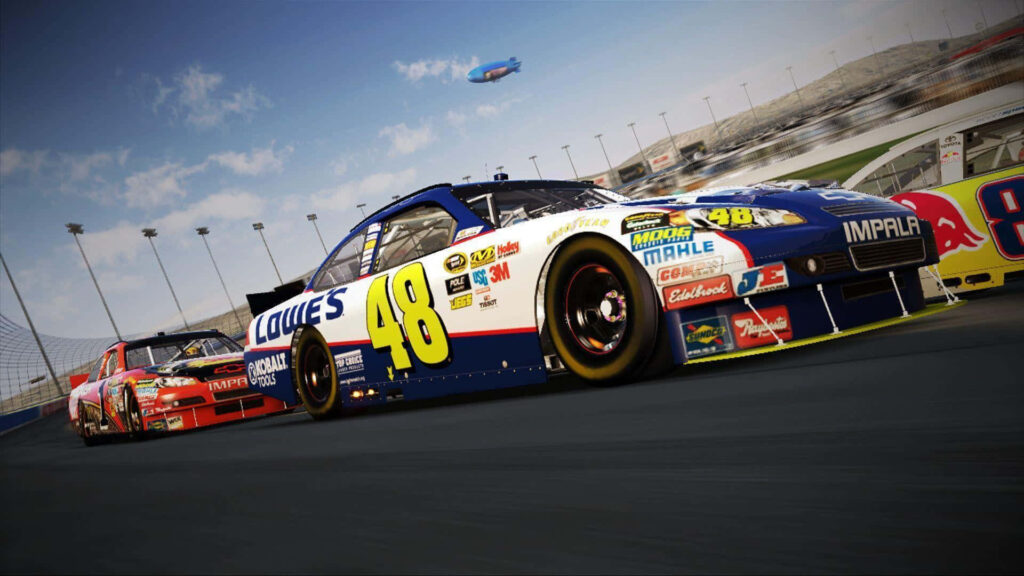 Nascar race cars speeding under bright stadium lights capturing high speed motorsports action wallpaper