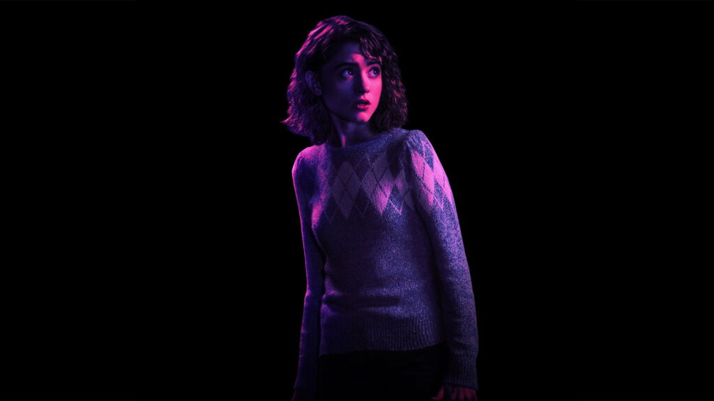 Natalia Dyer: Nancy Wheeler's Enchanting Presence in Stranger Things Season 2 - A Stunning HD Wallpaper Background Photo
