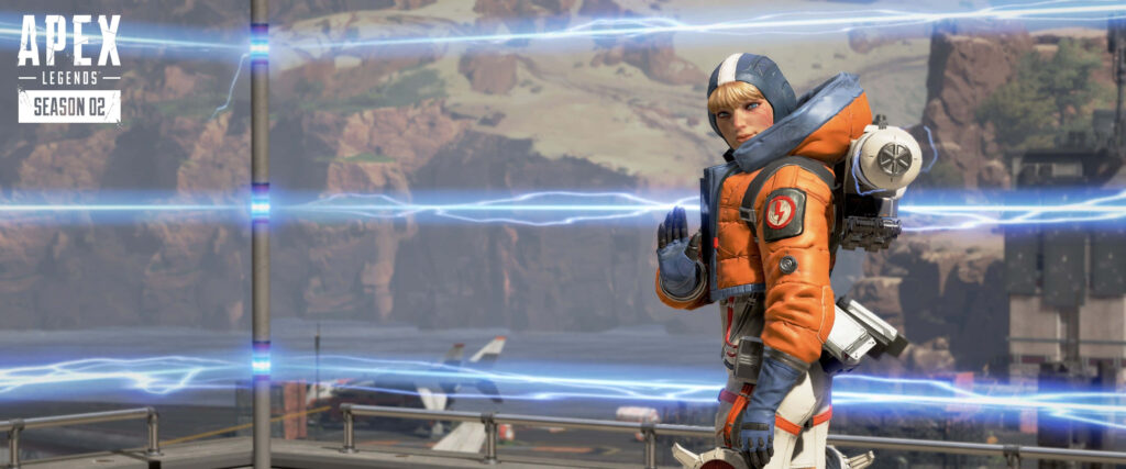 Natalie Wattson from Apex Legends standing confidently by electrified fences in vibrant background Wallpaper