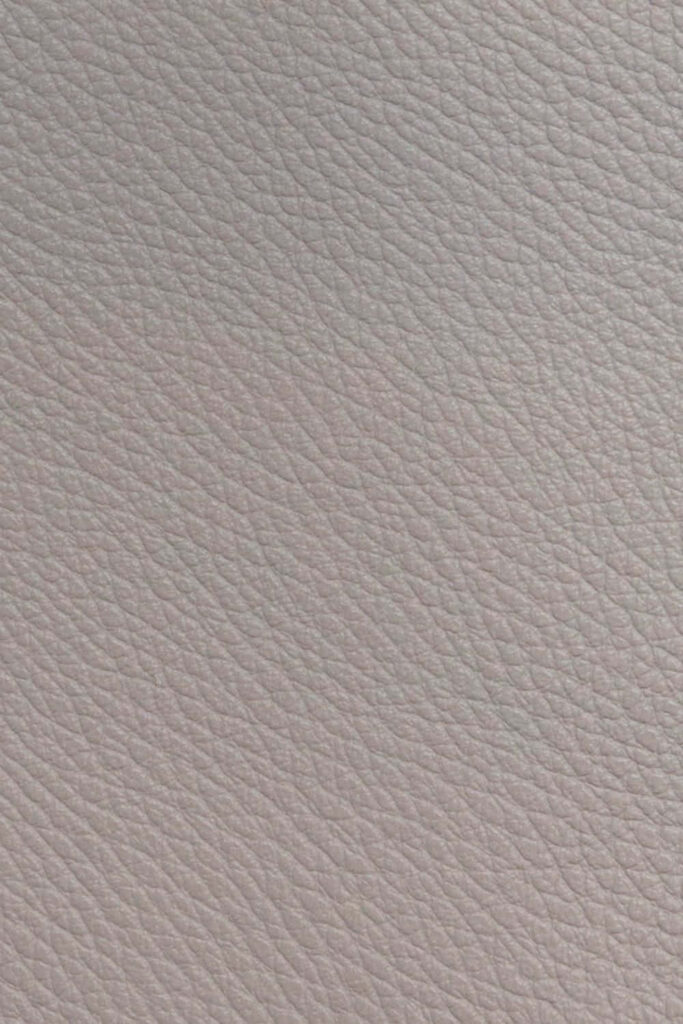 Close-Up Natural Light Grey Leather Texture for Design Inspiration Wallpaper