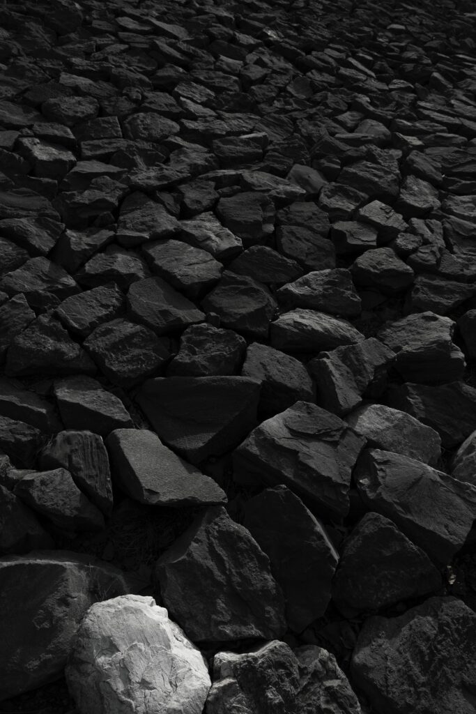 Textured Black and White Natural Stones Wallpaper Background