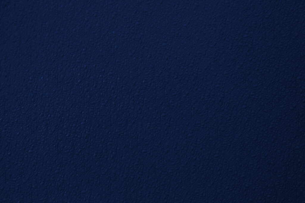 Navy Blue Plastic Texture: A 2K Graph-Quality Wallpaper Showcasing Bumpy and Dynamic Patterns