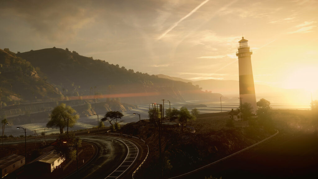 Serene coastal sunset with lighthouse island and winding road in Need for Speed game wallpaper