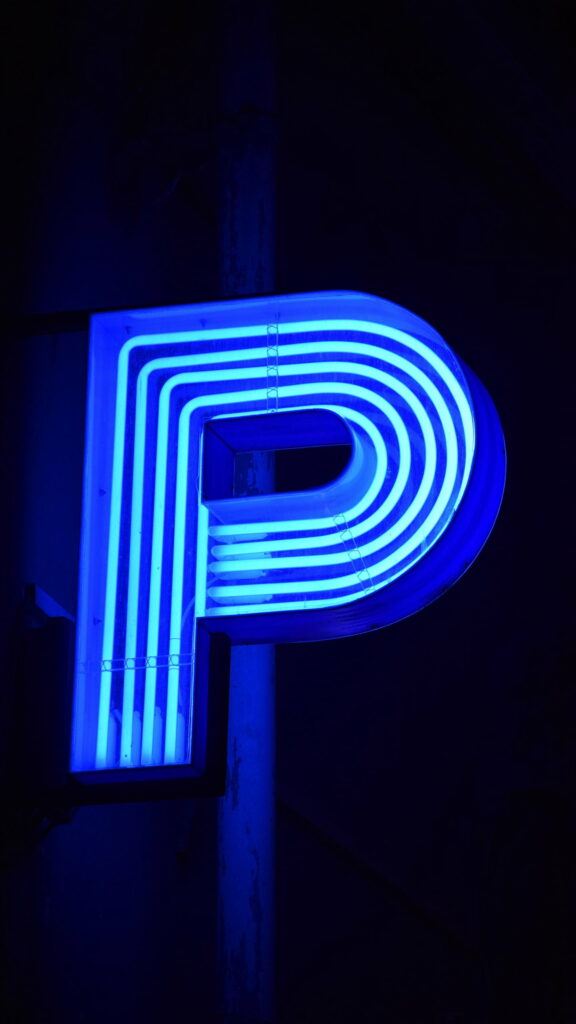 Blue Neon Alphabet: A Captivating HD Phone Wallpaper with Radiant Letter Lights