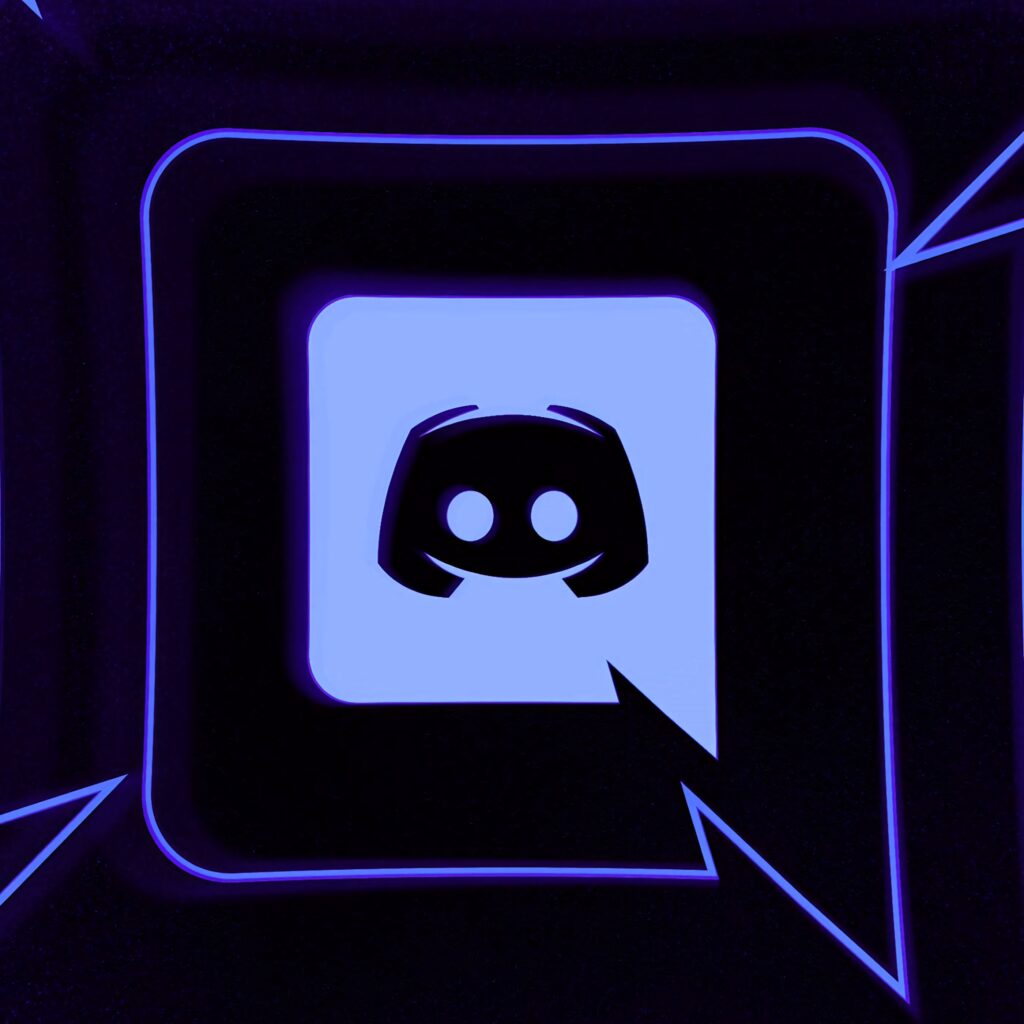 Vibrant Discord logo wallpaper with glowing neon blue and purple outlines and sleek tech design