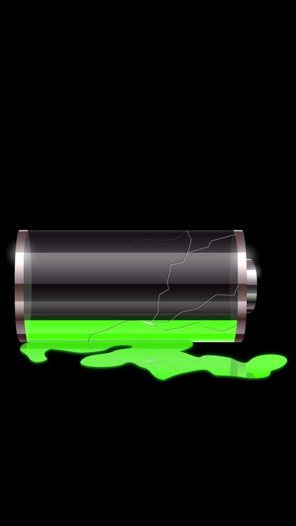 Neon green battery cracked open with glowing fluid on black background modern wallpaper