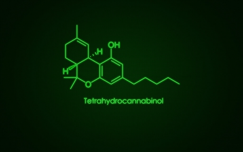 Neon green tetrahydrocannabinol structural formula on dark textured background wallpaper