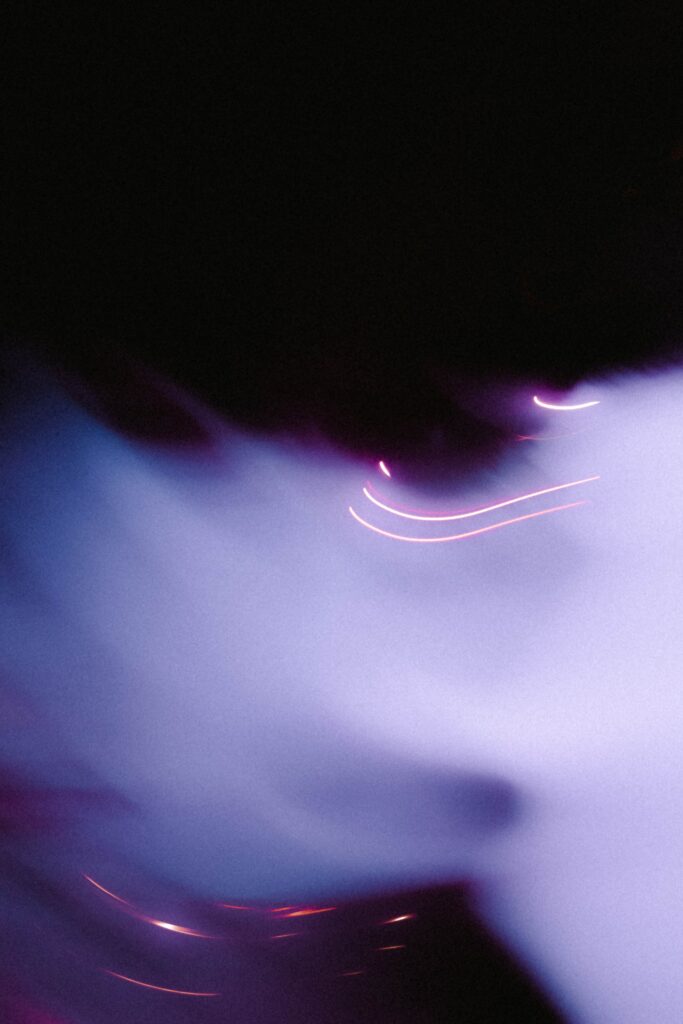 Neon Purple Abstract Wallpaper: Dynamic Flowing Lines Background