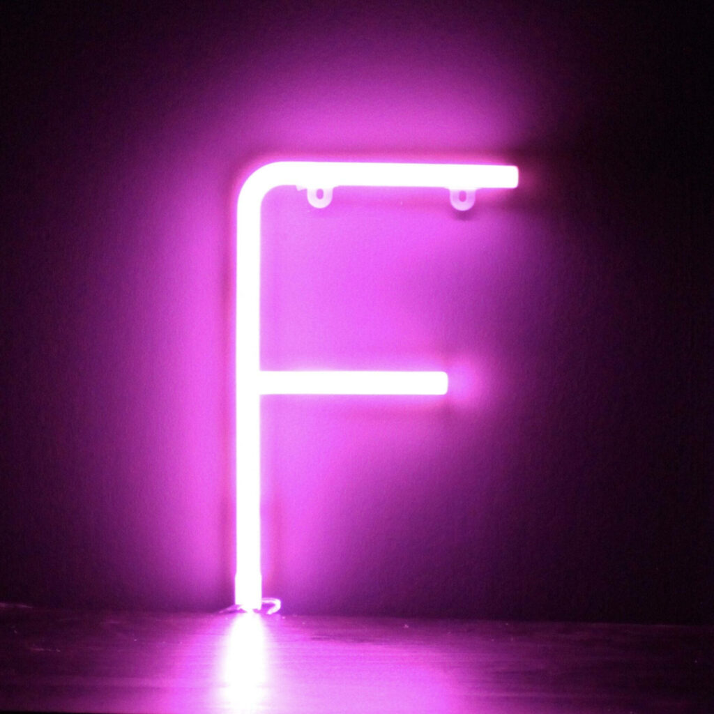 Neon purple glowing letter F wallpaper with dark background futuristic digital minimalist design