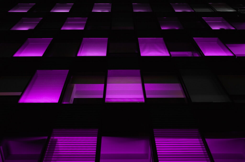 Windows of Purple Brilliance: Neon Backlight Illuminating the Dark - 5K Wallpaper Background