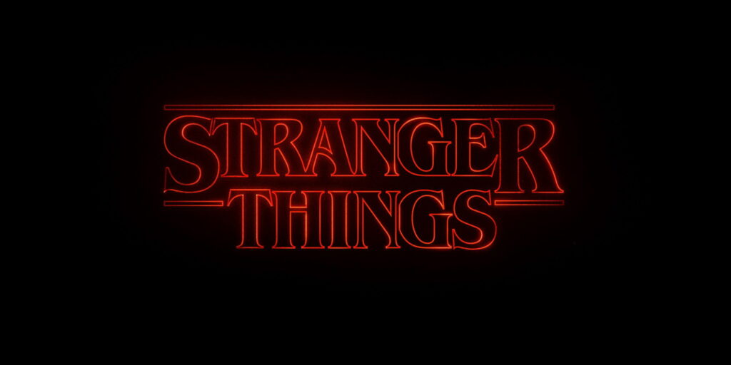 Stranger Things logo wallpaper glowing red serif text on black retro 80s Netflix sci-fi background
