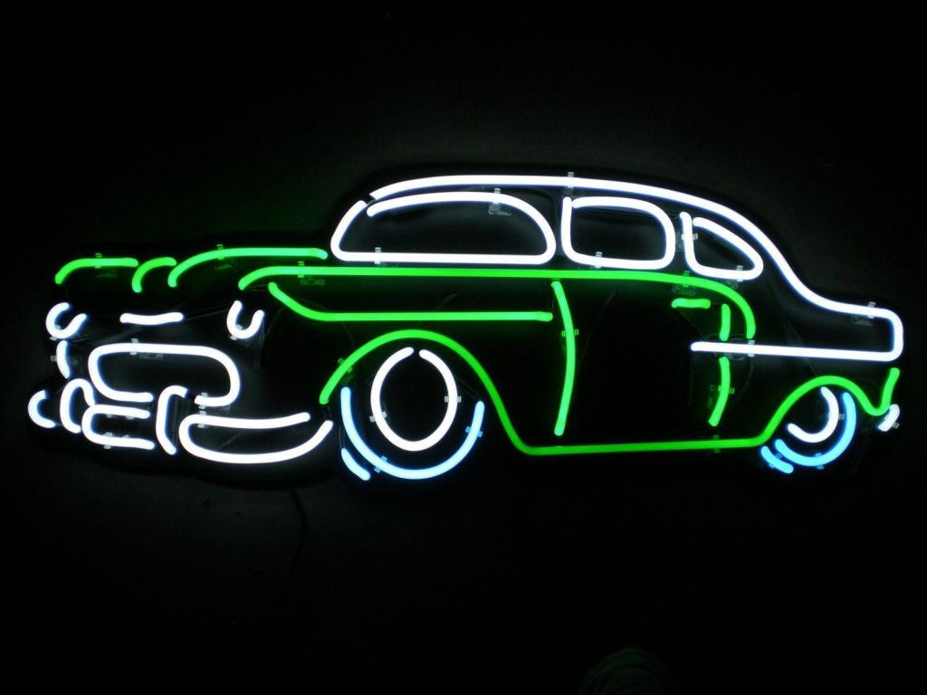 Neon vintage car outline wallpaper with glowing white green cyan lights on black background