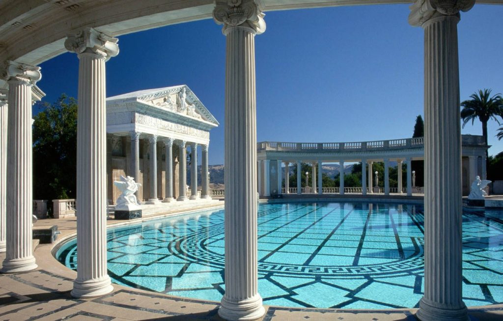 Neptune Pool at Hearst Castle with Roman columns turquoise water and intricate tile design Wallpaper