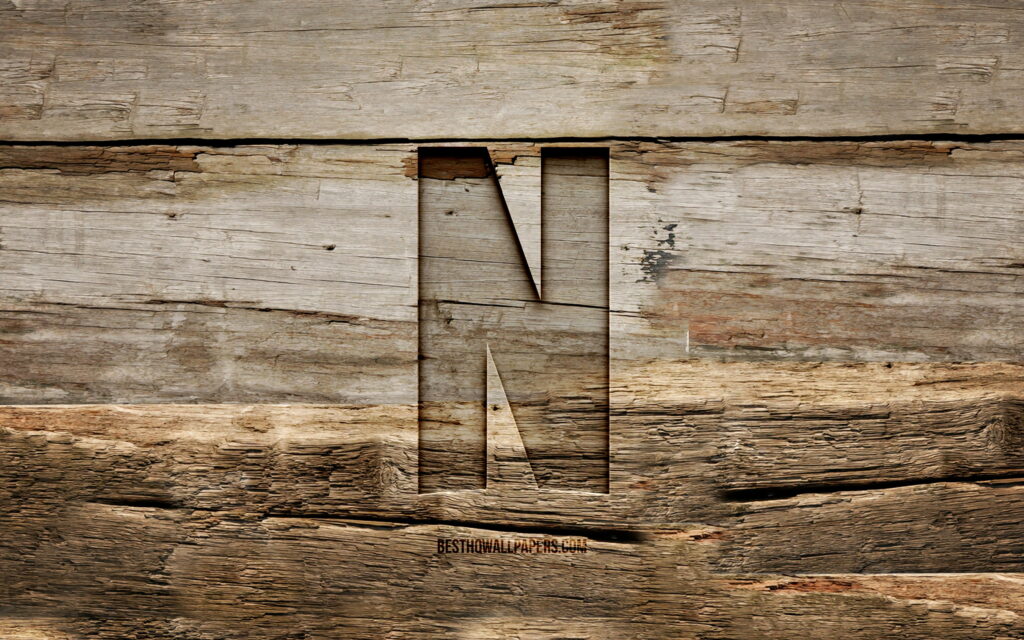 Netflix Logo Carved in Exquisite Wooden Background – A Creative 4K Wallpaper for Your Favorite Streaming Platform