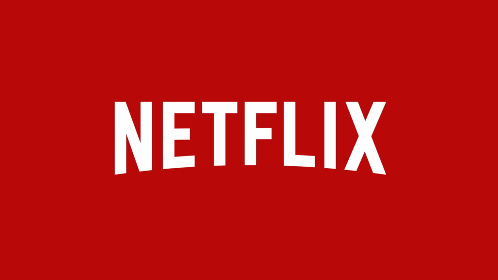 Streaming in Opulent Detail: Enhanced Wallpaper portraying Netflix's Signature Logo and Computer Background
