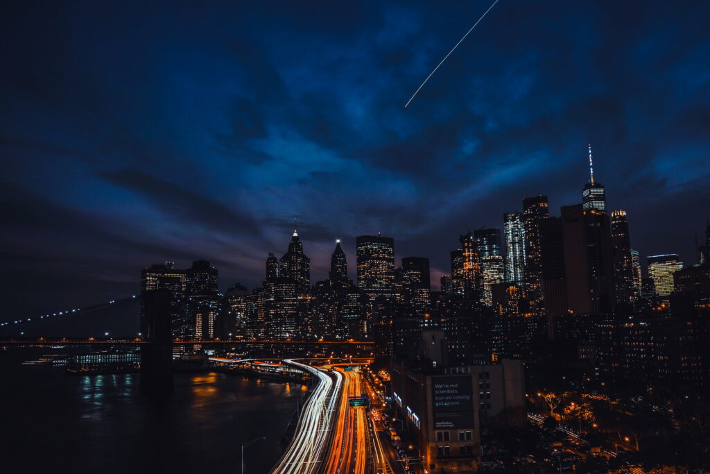 Nocturnal Splendor: Majestic New York City Skyline Illuminated in the Night Wallpaper