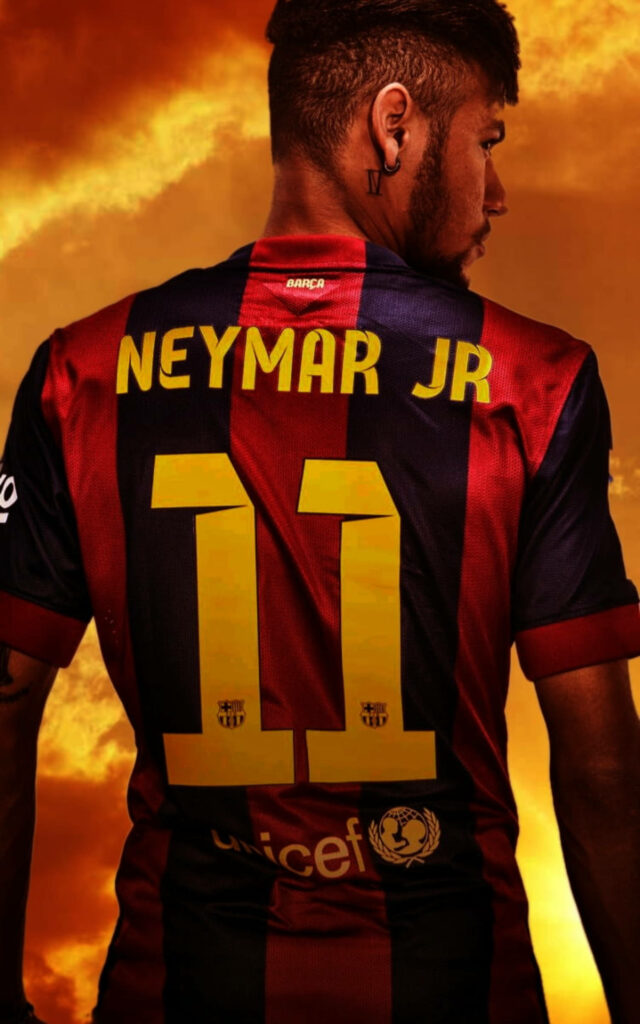 Neymar Jr's Vibrant Yellow Jersey: A Captivating Image of the Brazilian Soccer Superstar Wallpaper