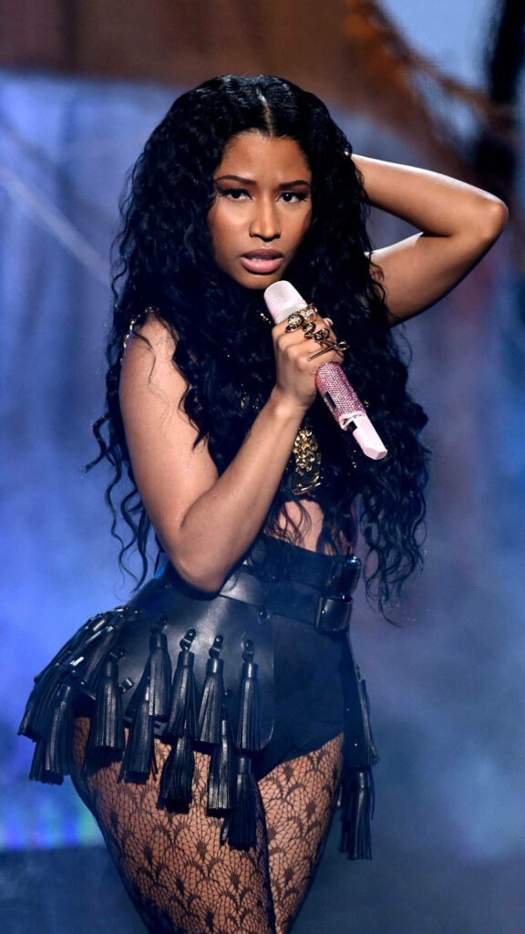 Nicki Minaj's Electrifying Performance Wallpaper: Bold Style & Presence
