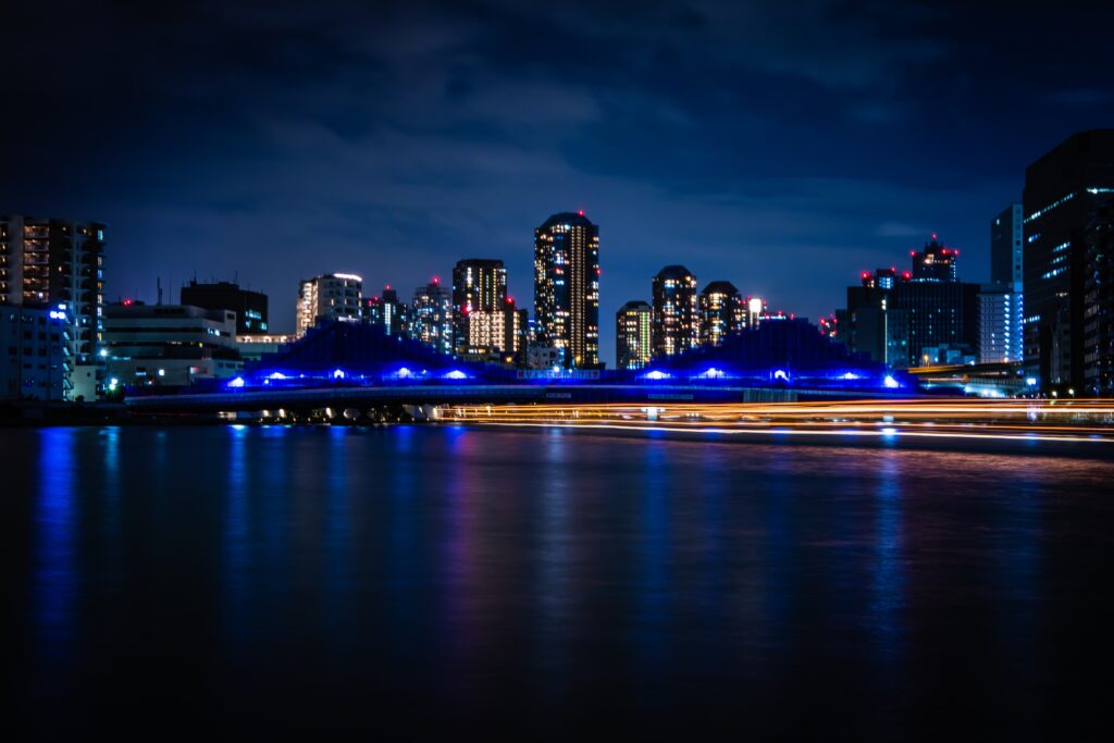 Stunning Cityscape Night Wallpaper: Illuminated Urban Bridge Reflections