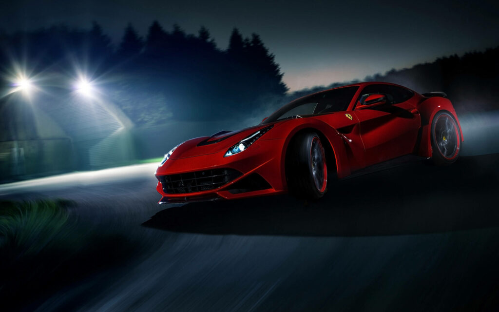 Sleek Ferrari F12 Speeding Through Night with Dynamic Lines and Ambient Lighting in Rosso Corsa - Italian Performance and Design in Motion Wallpaper