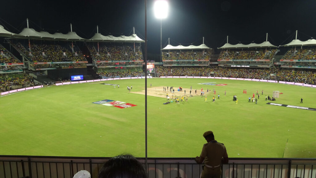 Nighttime Cricket Playground: Stunning 4K Wallpaper for Desktop