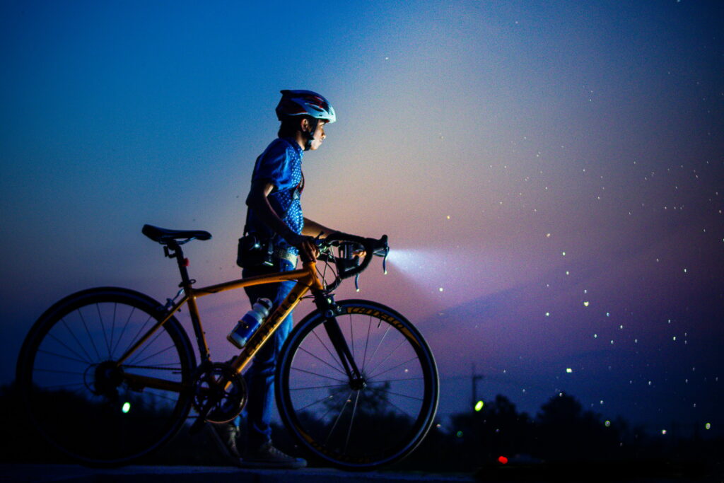 Nighttime Cycling: A Thrilling Adventure Underneath the Stars | 4K Wallpaper