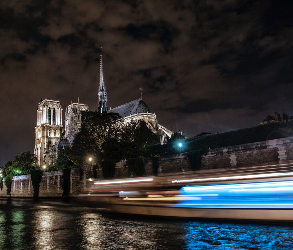 Nighttime Cityscape Wallpaper: Dramatic Architecture & Light Trails